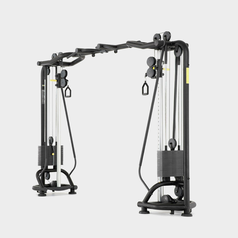 Technogym cable crossover machine, typical of commercial equipment used in hotel and compound gyms