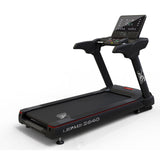 Leopard 2640 treadmill with wide running deck and touch screen.